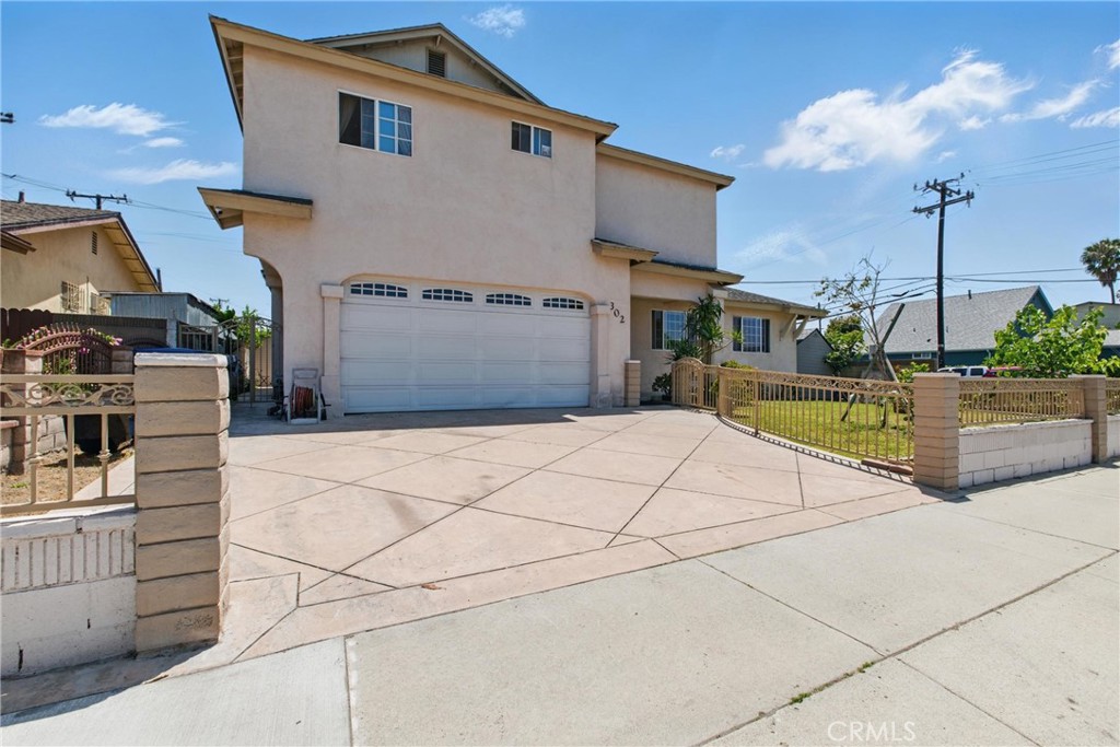 A property available for sale at 302 E 213th Street, Carson, CA 90745.