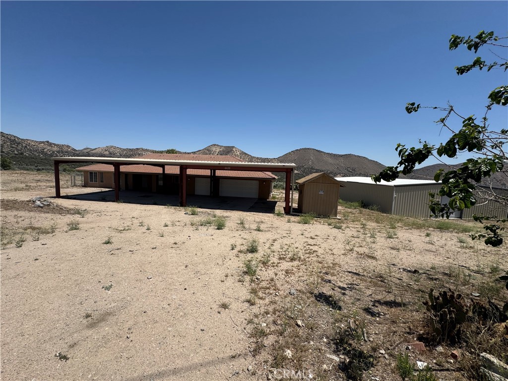 A property available for sale at 4426 Oil Well Road, Phelan, CA 92371.