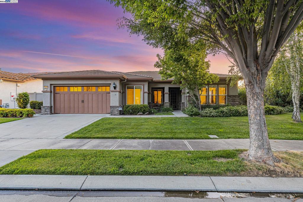 A property available for sale at 2453 Gardenstone Pl, Manteca, CA 95336.