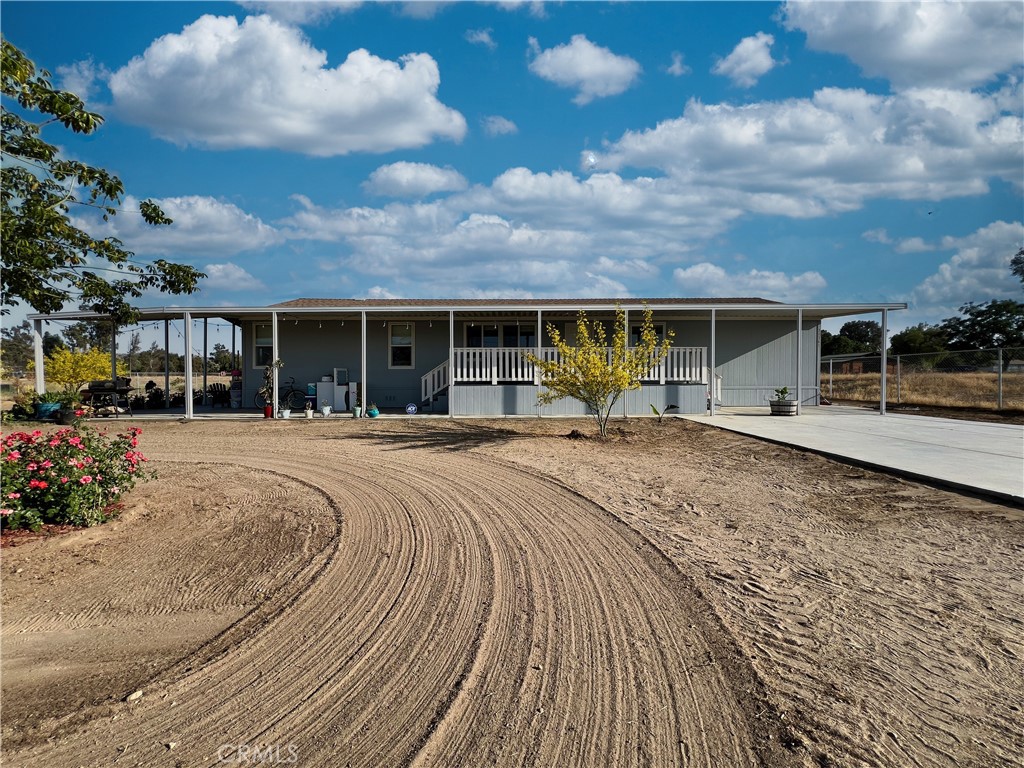A property available for sale at 31767 Wolfskill Avenue, Nuevo, CA 92567.