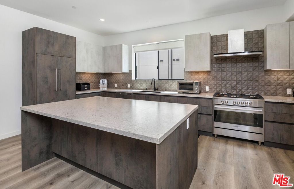 A property available for sale at 4724 N Village Court Lane, Valley Village, CA 91607.