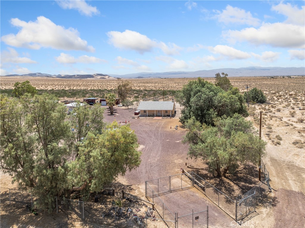 A property available for sale at 49333 Riverside Road, Newberry Springs, CA 92365.