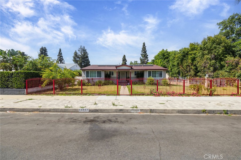A property available for sale at 14857 Tuba Street, San Fernando, CA 91345.