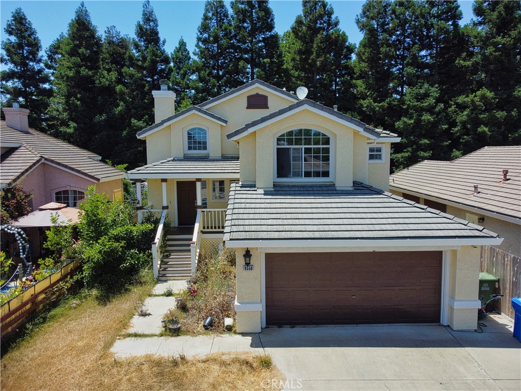 A property available for sale at 9550 Village Tree Drive, Elk Grove, CA 95758.