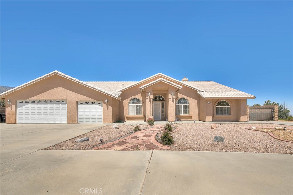 A property available for sale at 8250 Snow Cap Avenue, Pinon Hills, CA 92372.