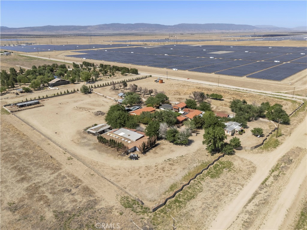 A property available for sale at 15374 Gaskell Road, Rosamond, CA 93560.