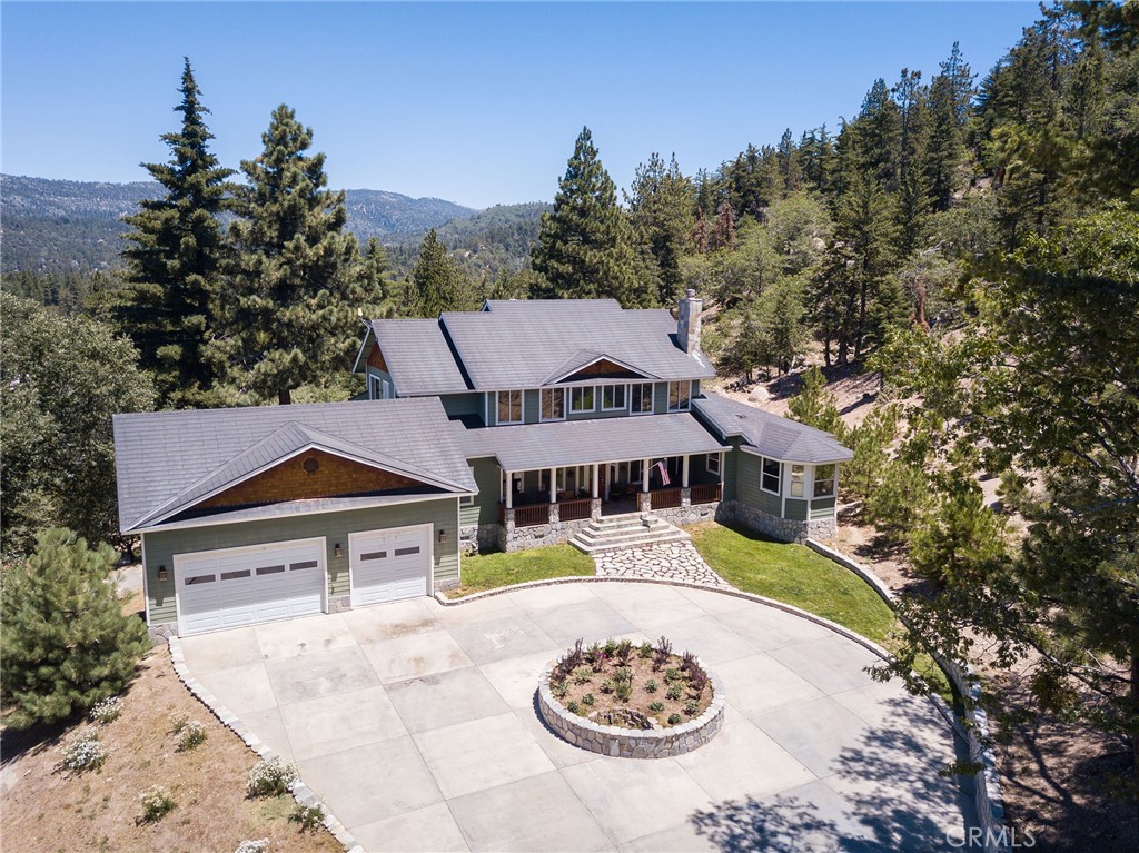 A property available for sale at 32557 Pine Cone Ct A&B, Running Springs, CA 92382.