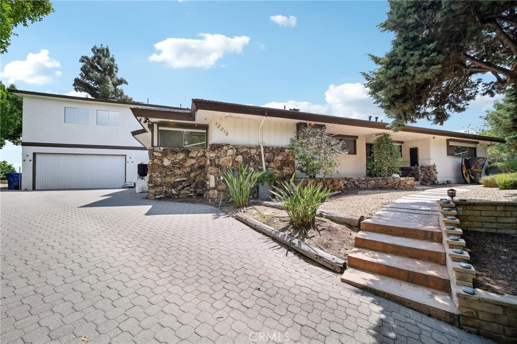 A property available for sale at 12218 Sarazen Place, Granada Hills, CA 91344.