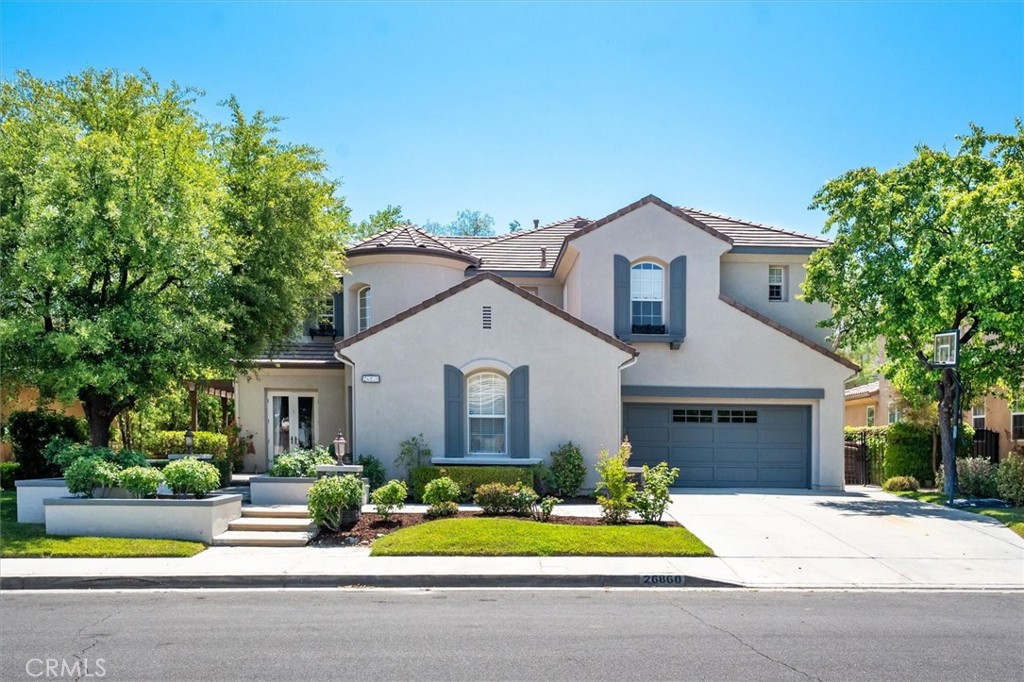 A property available for sale at 26860 Chaucer Place, Stevenson Ranch, CA 91381.