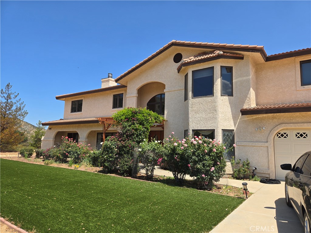 A property available for sale at 30240 Aliso Canyon Road, Acton, CA 93510.