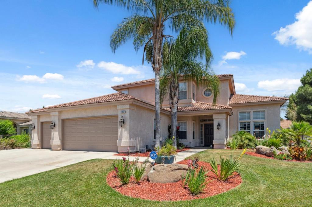 A property available for sale at 7355 Edgewater Street, Chowchilla, CA 93610.