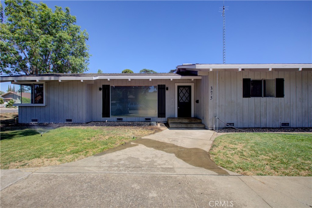 A property available for sale at 375 K Street, Patterson, CA 95363.