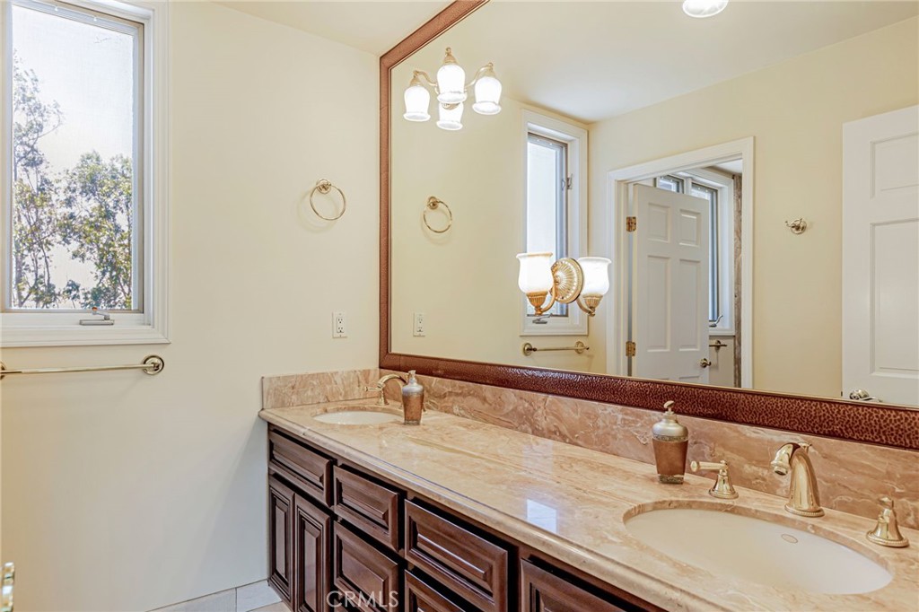 A property available for sale at 20585 Whispering Oaks Drive, San Jose, CA 95120.
