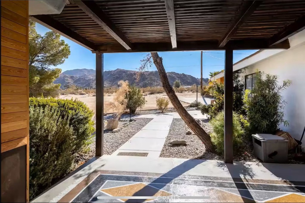 A property available for sale at 70138 Sullivan Road, 29 Palms, CA 92277.