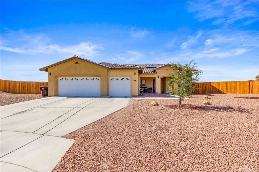 A property available for sale at 74104 Cactus Wren Court, 29 Palms, CA 92277.
