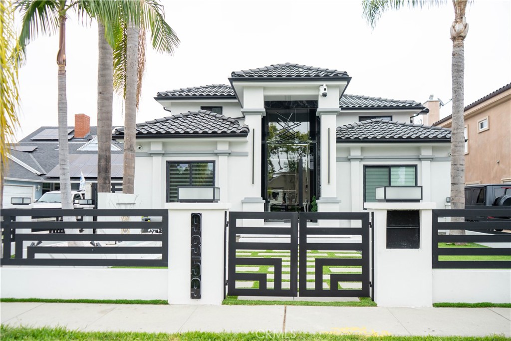 A property available for sale at 9359 Cecilia Street, Downey, CA 90241.