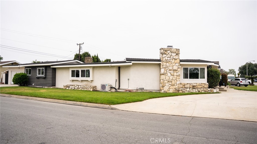 A property available for sale at 9837 Belfair Street, Bellflower, CA 90706.