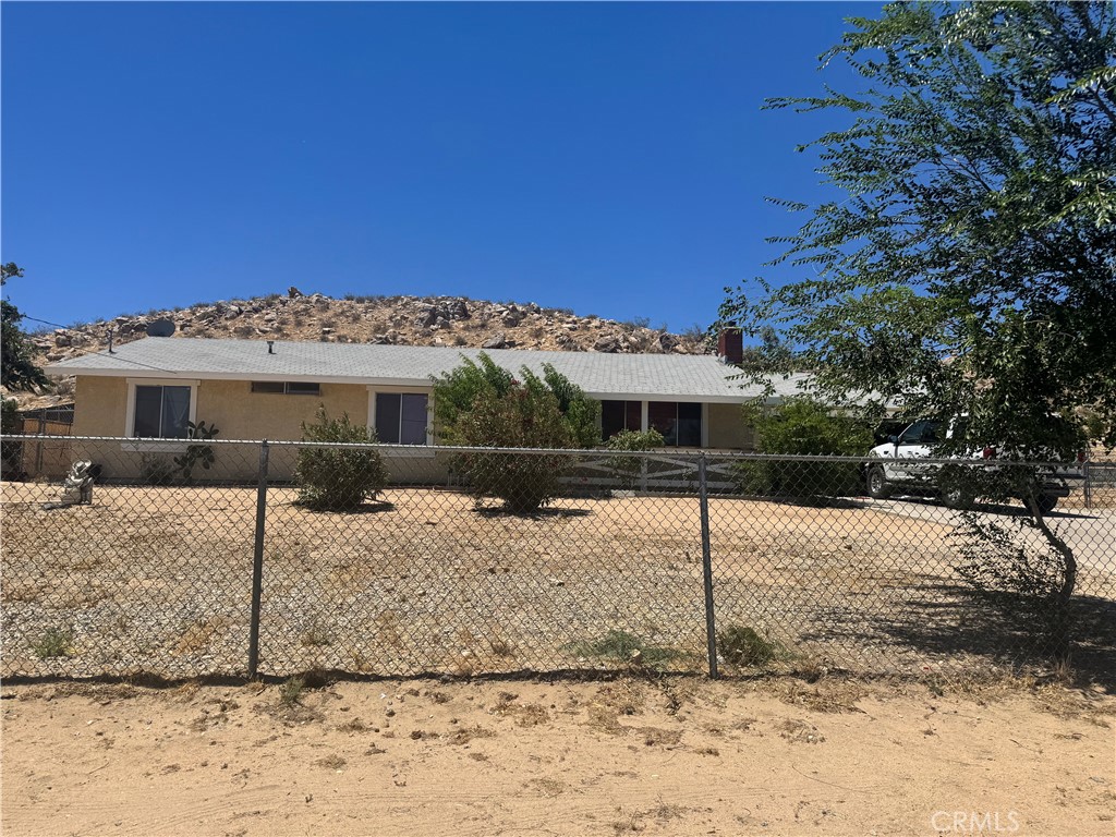 A property available for sale at 16840 Mackennas Gold Avenue, Lake Los Angeles, CA 93591.