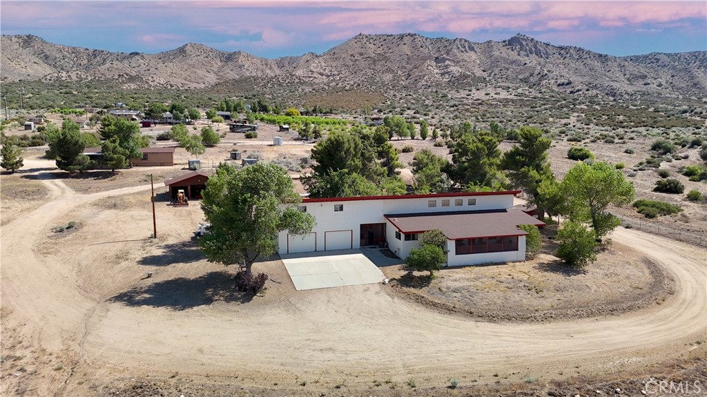 A property available for sale at 6474 Macapa Drive, Phelan, CA 92371.
