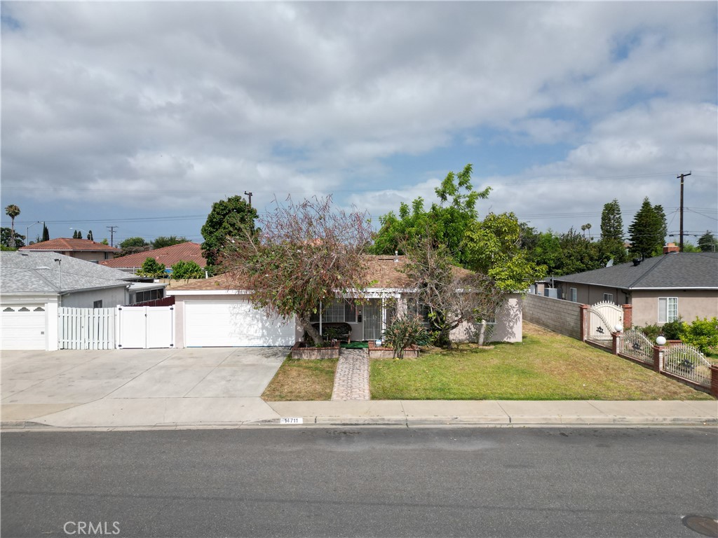 A property available for sale at 14711 Riata Street, Midway City, CA 92655.