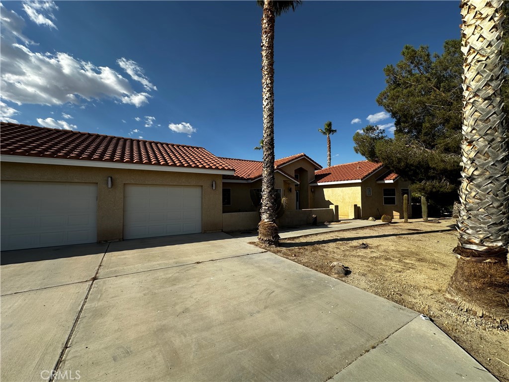 A property available for sale at 8433 Prospect Street, Mojave, CA 93501.