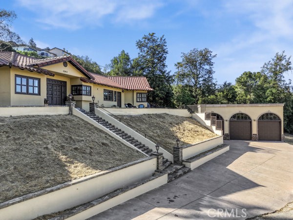 A property available for sale at 23911 Homezell Drive, West Hills, CA 91304.