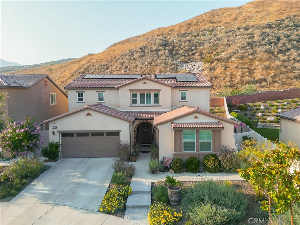 A property available for sale at 30912 Marbella Way, Highland, CA 92346.