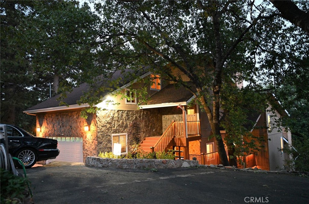 A property available for sale at 2461 Spring Oak Drive, Running Springs, CA 92382.