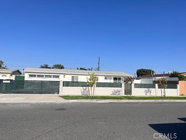 A property available for sale at 14572 Purdy Street, Midway City, CA 92655.