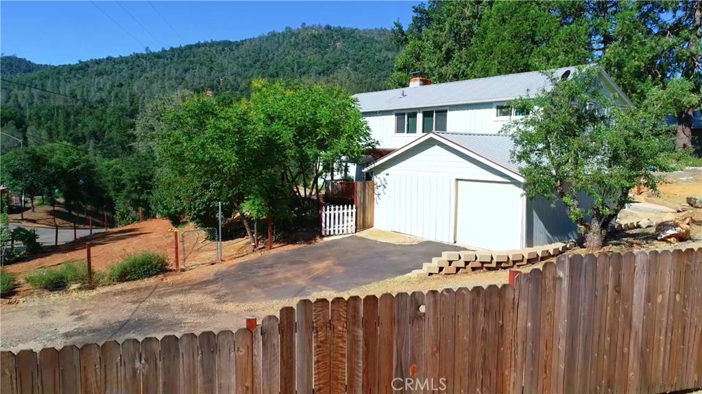 A property available for sale at 4980 Ponderosa Way, Midpines, CA 95325.