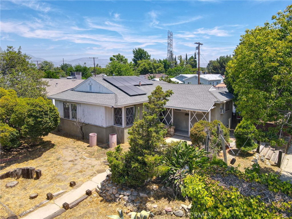 A property available for sale at 10330 Woodman Avenue, San Fernando, CA 91345.