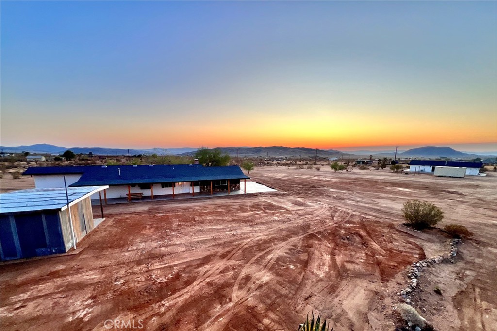 A property available for sale at 56056 Cone Boulevard, Landers, CA 92285.