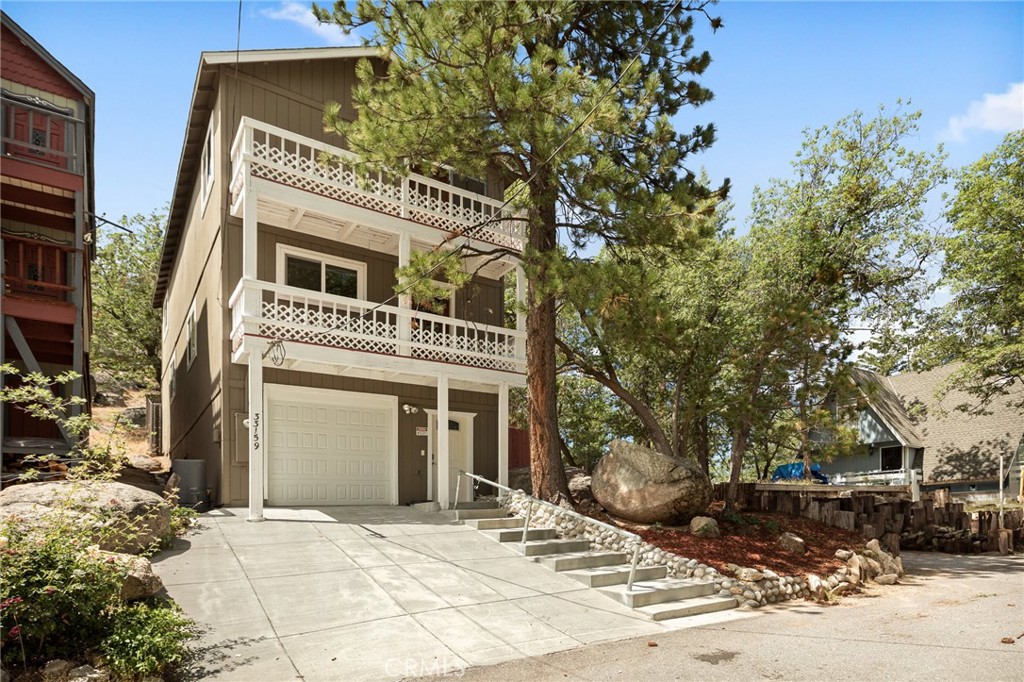 A property available for sale at 33159 Ridge Road, Arrowbear, CA 92308.