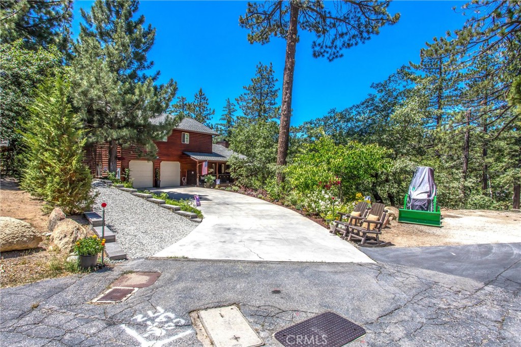 A property available for sale at 32425 Snowshoe Lane, Running Springs, CA 92382.