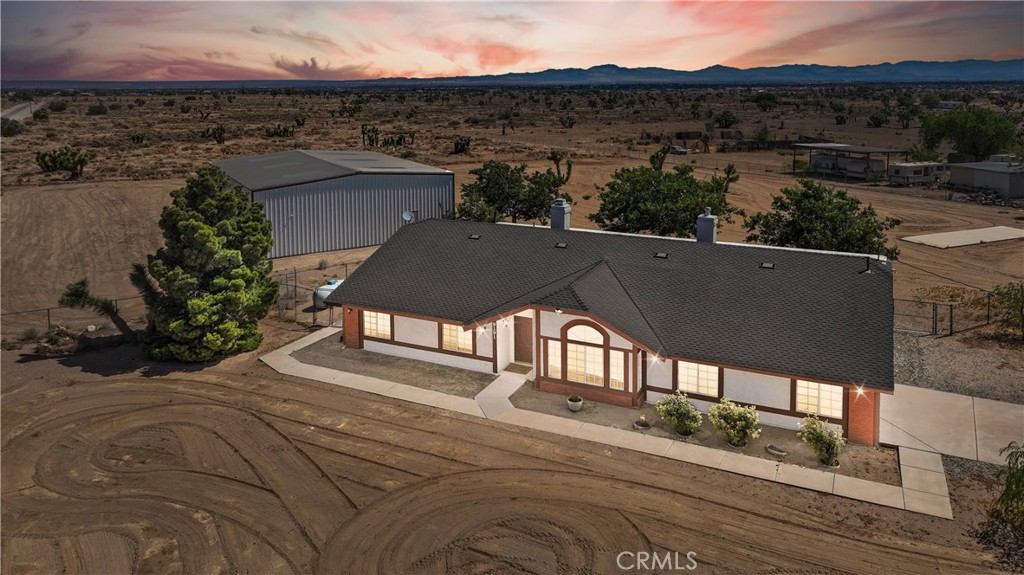 A property available for sale at 9191 White Road, Phelan, CA 92371.