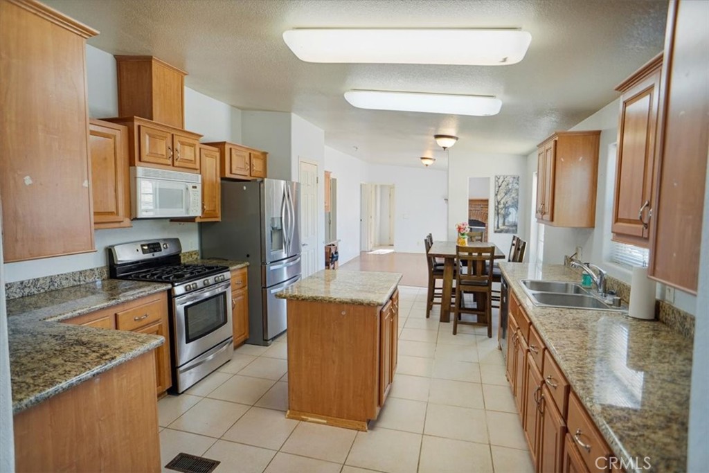 A property available for sale at 12332 E Avenue X, Pearblossom, CA 93553.
